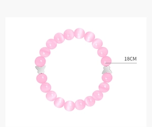 Detailed view of pink cat eye bead bracelet with silver butterfly charms, 18cm length
