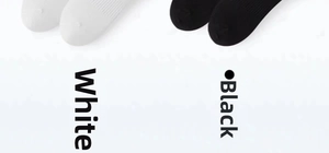 Detail shot of black and white ribbed cotton socks featuring reinforced toe construction