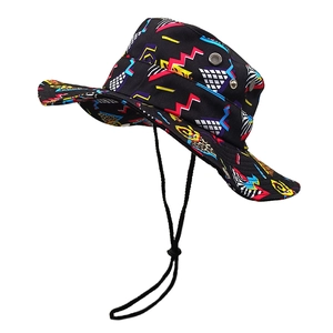 Detail of geometric pattern bucket hat with adjustable chin strap and breathable eyelets
