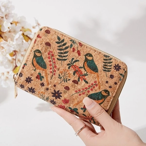 Women's vintage cork wallet with floral and bird prints and golden zipper closure