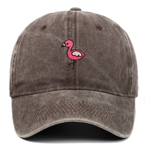 Close-up of pink flamingo embroidery on vintage washed dark grey cotton baseball cap