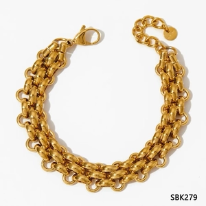 Detailed view of a chunky gold chain bracelet with lobster clasp on a white background