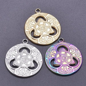 Three-color Celtic knot charms in gold, silver, and rainbow stainless steel finishes