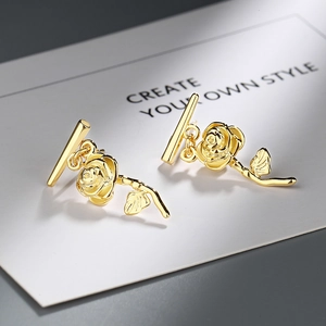 Elegant 3D rose flower stud earrings in polished gold finish for a minimalist style