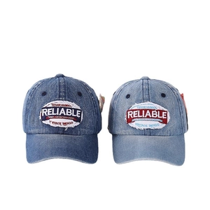 Vintage kids denim baseball caps in dark and light blue with embroidered patches