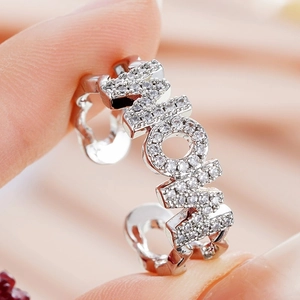 Detail of silver MOM open ring with pavé-set white zircons for Mother's Day gift