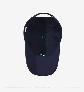 Detailed interior view of the navy cotton baseball cap showing lining and adjustable strap