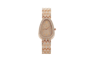 Detailed macro view of the rose gold snake-shaped luxury watch with full crystal pavé