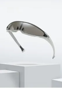 Close-up of futuristic silver Y2K sunglasses with sleek metallic temples and dark lenses