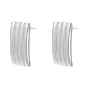 Macro shot of silver plated rectangular earrings with textured vertical ridges on a pair