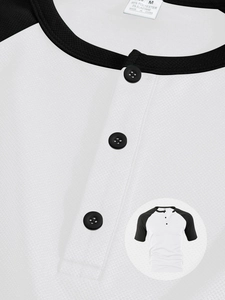 Macro shot of breathable fabric texture on black and white V-neck men's shirt