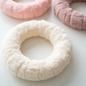 Handmade wool felt Christmas wreaths in white and pink plush striped textured design