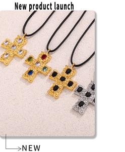 Detail showing hammered texture cross pendants with colorful oval gemstone inlays