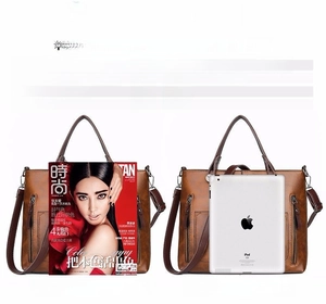 Visual size comparison of the vintage leather tote bag with a magazine and an iPad