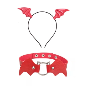 Detail view of red leather choker with metal ring and matching bat wing headband