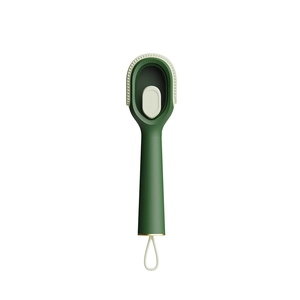 Ergonomic liquid-dispensing shoe brush in dark green with soft bristles and hanging strap