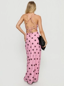 Detail of cross lace-up open back design on pink polka dot slim maxi dress