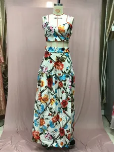 Detailed view of floral two-piece set featuring cropped top and high-waist maxi skirt