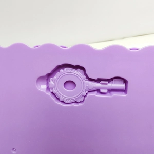 DIY purple silicone jewelry mold in ornate key shape for craft and resin art storage