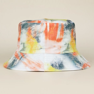 Detailed view of tie-dye bucket hat with reinforced brim stitching and vibrant patterns