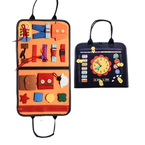 Montessori busy board for kids learning life skills and time recognition on felt bag