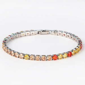 Detail of silver tennis bracelet with multi-color square-cut cubic zirconia in gradient
