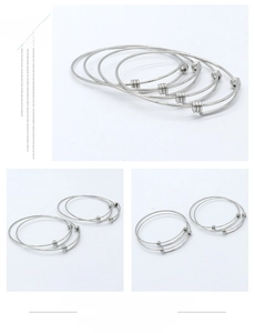 Detail of adjustable 304 stainless steel bangle with slide closure mechanism in silver finish