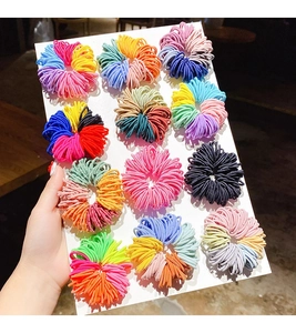 Close-up of colorful elastic hair bands for kids set of 12 on a display card