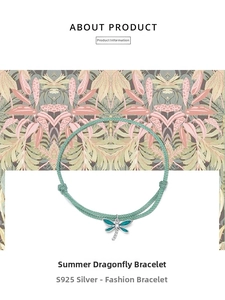 Detail of S925 silver dragonfly charm with green enamel and zircon on woven rope