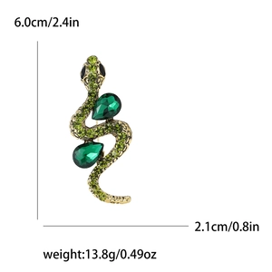 Detail showing dimensions of snake brooch with green rhinestones, 6.0cm by 2.1cm