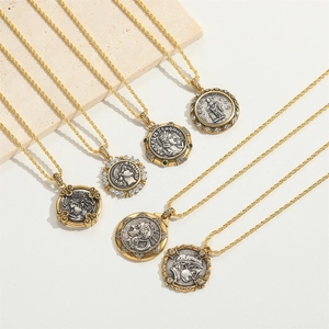 Macro display of retro coin necklaces with relief portraits and zircon embellishments