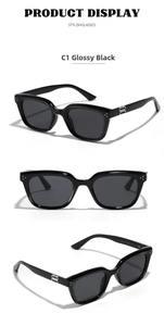 Detailed views of bright black cat eye sunglasses with silver rivets and metal accents