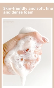 Macro shot of thick, dense white foam from a facial sponge for deep skin cleansing