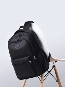 Waterproof black nylon backpack with high capacity for travel and business laptop storage