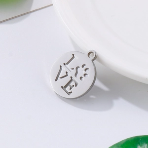 Polished silver titanium steel pendant with cutout LOVE and paw print design