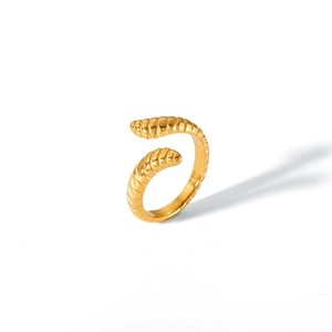 Detail of 18K gold stainless steel open ring featuring spiral layered horn texture