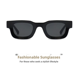 Detailed close-up of rectangular black frames and dark lenses for stylish sunglasses