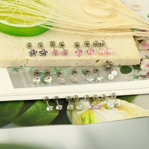 24-piece set of pink and silver stainless steel screw back earrings with star and heart designs