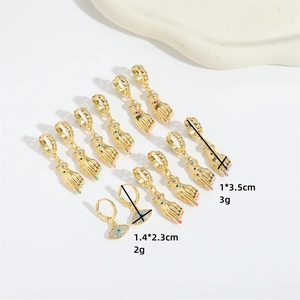 Retro golden hand and evil eye earrings set with colorful enamel and rhinestones