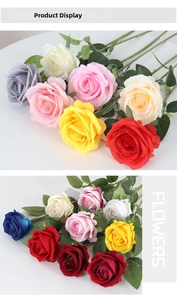 Detail showing multi-colored velvet faux roses with realistic silk texture and green leaves