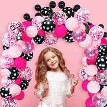 Pink and black balloon arch kit with confetti balloons and polka dots for party backdrop