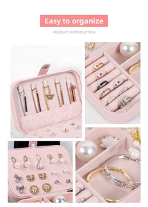 Pink PU leather jewelry box detail with inner velvet compartments for rings and necklaces