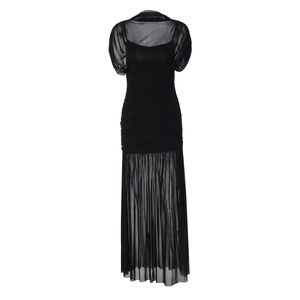 Detail of elegant black dress with mesh patchwork and sheer puff sleeves showing texture