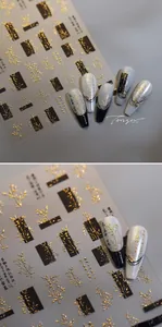 Vue détaillée de stickers pour ongles style chinois avec bambou doré et effet relief