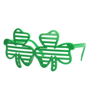 Close-up of green shamrock shutter glasses for St. Patrick's Day party favor