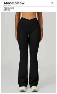 Vue détaillée du pantalon de yoga noir à taille haute avec ceinture en V et poches latérales