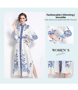 Detail view of blue porcelain floral dress showing buttoned collar and side slit hemline