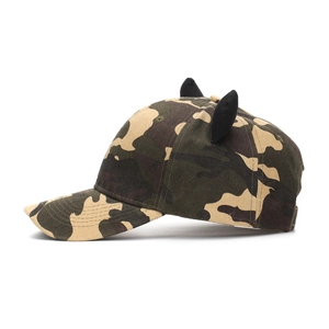 Side view of camouflage baseball cap featuring cute black plush cat ears decoration
