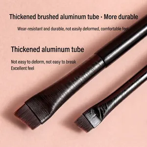 Ultra-thin angled eyebrow brush with durable brushed aluminum ferrule and fine fiber bristles
