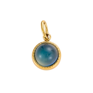 Close-up of circular gold frame pendant with translucent turquoise gemstone inlay